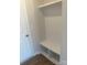 Mudroom with cubbies and wood look floors for added convenience at 2616 Tillman St, Monroe, NC 28112