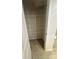 Walk-in pantry with tiled flooring, built-in wire shelves, and ample storage space at 2616 Tillman St, Monroe, NC 28112