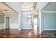 Grand foyer featuring a staircase, hardwood floors, and ample natural light at 279 Age Old Way, Rock Hill, SC 29732