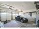 Spacious garage with car, shelving, storage and lighting, perfect for parking and projects at 279 Age Old Way, Rock Hill, SC 29732