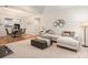 This open floorplan connects the living area and dining space, enhancing flow and natural light at 2941 Bellasera Way, Matthews, NC 28105