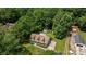 Aerial view showcases the home with lush greenery and the convenience of a wheelchair ramp at 3039 Paraham S Rd, York, SC 29745