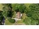 Aerial view of the home surrounded by mature trees, showing driveway access at 3039 Paraham S Rd, York, SC 29745