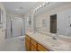 The bathroom has a shower/tub combo, a toilet, and double vanity with a sink and large mirror at 3039 Paraham S Rd, York, SC 29745