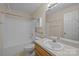 Well-lit bathroom with a sink vanity, toilet, and a shower-tub combo at 3039 Paraham S Rd, York, SC 29745