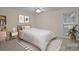 Comfortable bedroom with neutral tones, a workspace, and lots of natural light at 3039 Paraham S Rd, York, SC 29745