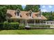 Charming home with dormer windows, a wide front porch, and a convenient wheelchair ramp for easy access at 3039 Paraham S Rd, York, SC 29745