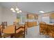 Kitchen with oak cabinets, matching wooden table and chairs and access to the back yard at 3039 Paraham S Rd, York, SC 29745