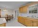Bright kitchen nook with a dining table, backyard access, and light countertops, offering a cozy spot for meals at 3039 Paraham S Rd, York, SC 29745