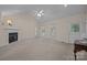 Bright living room featuring fireplace, vaulted ceilings, neutral walls, and carpet flooring at 3039 Paraham S Rd, York, SC 29745