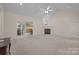 Spacious living room with fireplace, vaulted ceilings, neutral walls, open to dining room and kitchen at 3039 Paraham S Rd, York, SC 29745
