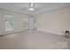 This bedroom features multiple windows for natural light, neutral paint and is carpeted at 3039 Paraham S Rd, York, SC 29745
