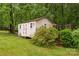 A backyard shed surrounded by trees and shrubbery at 3039 Paraham S Rd, York, SC 29745