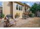 This cozy backyard patio features a BBQ grill and a quaint outdoor dining set at 3439 Richards Xing, Fort Mill, SC 29708