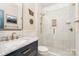 Elegant bathroom with a marble vanity, glass-enclosed shower, and brushed gold fixtures at 3439 Richards Xing, Fort Mill, SC 29708