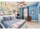 Stylish bedroom with a colorful accent wall, modern furniture, and built-in shelving at 3439 Richards Xing, Fort Mill, SC 29708