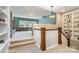 Upstairs bonus room with built-in shelving and a cozy seating area at 3439 Richards Xing, Fort Mill, SC 29708