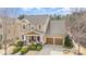 Charming two-story home featuring a welcoming front porch, manicured lawn, and a two-car garage at 3439 Richards Xing, Fort Mill, SC 29708