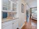 Inviting hallway with hardwood floors, leading to bright and airy living spaces at 3439 Richards Xing, Fort Mill, SC 29708