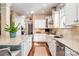 Spacious kitchen with granite countertops, stainless steel appliances, and hardwood floors at 3439 Richards Xing, Fort Mill, SC 29708