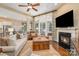 Bright living room with fireplace, large windows, and open floor plan at 3439 Richards Xing, Fort Mill, SC 29708
