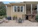 Cozy patio with brick pavers, an outdoor dining set, and access to a covered porch at 3439 Richards Xing, Fort Mill, SC 29708
