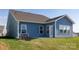 The backyard has a patio and grassy area at 40189 Crooked Stick Dr # 1205, Lancaster, SC 29720