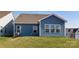 The backyard has a grassy area at 40189 Crooked Stick Dr # 1205, Lancaster, SC 29720
