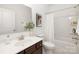 Bathroom with modern vanity, white countertops, and shower-tub combo with shower curtain at 40189 Crooked Stick Dr # 1205, Lancaster, SC 29720