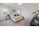 Serene bedroom showcasing a cozy bed with plush linens, side tables, and large windows for natural light at 40189 Crooked Stick Dr # 1205, Lancaster, SC 29720