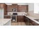 Well-equipped kitchen with stainless steel appliances, granite countertops, and ample cabinet space at 40189 Crooked Stick Dr # 1205, Lancaster, SC 29720