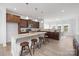 Beautiful kitchen with granite countertops, stainless steel appliances, and a large island with seating at 40189 Crooked Stick Dr # 1205, Lancaster, SC 29720