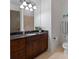 The bathroom boasts modern vanity with granite counters and neutral paint at 4336 Tottenham Rd, Charlotte, NC 28226