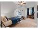 This bedroom features a high ceiling, stylish decor, and a cozy reading nook at 4336 Tottenham Rd, Charlotte, NC 28226