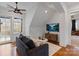 Cozy bonus room featuring vaulted ceilings, natural light, and comfortable seating area at 4336 Tottenham Rd, Charlotte, NC 28226