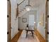 Cozy office nook with hardwood flooring, and a modern chandelier at 4336 Tottenham Rd, Charlotte, NC 28226