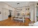 Elegant kitchen with an island, bar stool seating, and modern lighting at 4336 Tottenham Rd, Charlotte, NC 28226