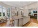 Gourmet kitchen featuring a large island, stainless appliances, and natural light at 4336 Tottenham Rd, Charlotte, NC 28226