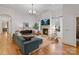 Bright living room with modern fireplace, comfortable seating, and stylish decor at 4336 Tottenham Rd, Charlotte, NC 28226