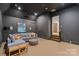 Comfortable media room features a projector, movie screen, and a large sectional sofa at 4336 Tottenham Rd, Charlotte, NC 28226