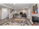 Spacious finished basement with a staircase, stylish seating, and an open layout for entertainment at 632 N Oakland Ave # Pt1, Statesville, NC 28677