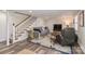 Inviting finished basement featuring stylish seating, wood-look floors, and a cozy atmosphere at 632 N Oakland Ave # Pt1, Statesville, NC 28677