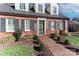 Charming home with brick pathway, shutters, and manicured landscaping at 632 N Oakland Ave # Pt1, Statesville, NC 28677