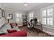 Relaxing office features a comfy couch, shutters, and streamlined desk at 632 N Oakland Ave # Pt1, Statesville, NC 28677