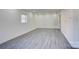 Finished basement featuring recessed lighting, wood look flooring, and natural light at 7526 Dorn Cir, Charlotte, NC 28212