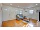 Inviting living room with hardwood floors, comfortable seating, and ample natural light at 7526 Dorn Cir, Charlotte, NC 28212