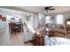 Open-concept living room showcasing hardwood floors, fireplace, and seamless transition to the dining area at 10929 Lassen Ct, Charlotte, NC 28214
