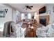 Bright living room with a fireplace, comfortable seating, and ample natural light at 10929 Lassen Ct, Charlotte, NC 28214