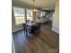 Traditional dining room with table and chairs, lots of natural light and dark wood floors at 110 Amber Ln, Statesville, NC 28677