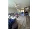Inviting living room featuring stone fireplace, neutral walls, and modern flooring at 110 Amber Ln, Statesville, NC 28677